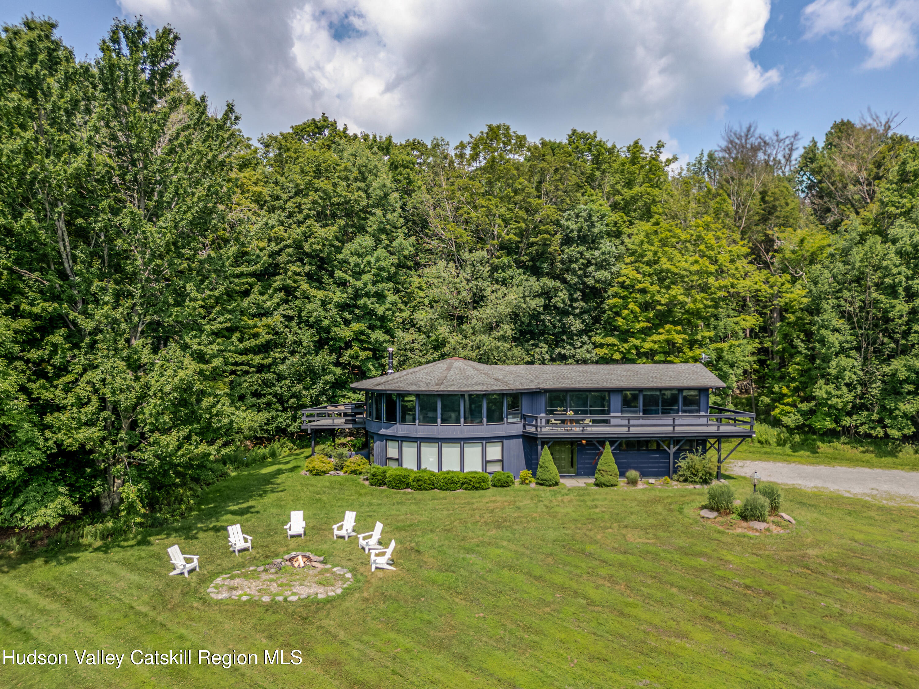 407 Mill Street Windham, NY 12496 - Photo 5 of 39 a view of a house with a swimming pool