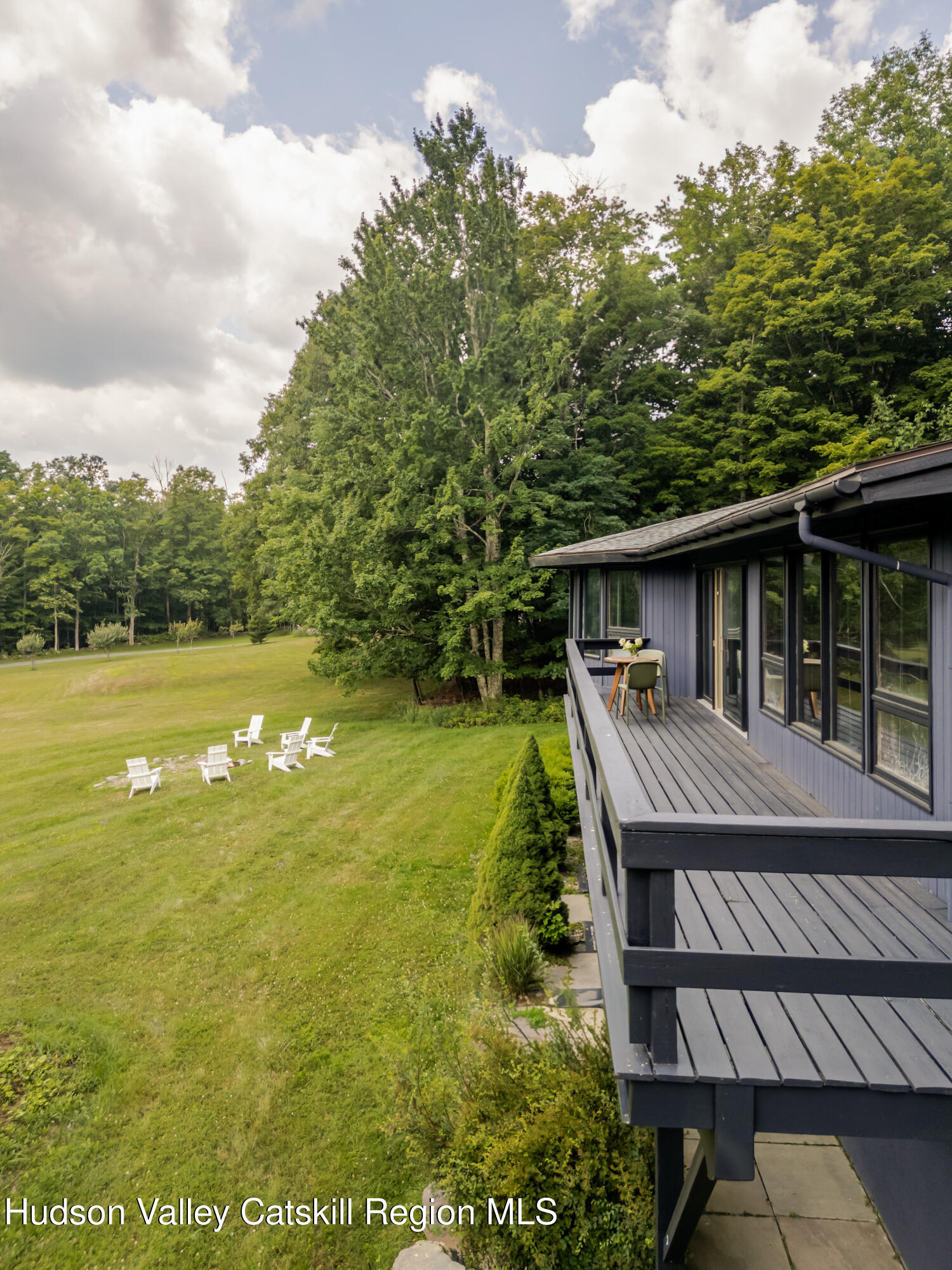 407 Mill Street Windham, NY 12496 - Photo 6 of 39 a view of a house with pool and a chairs