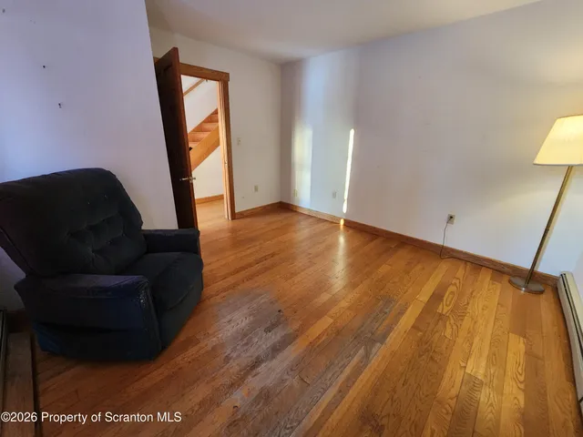 a living room with a couch and a table
