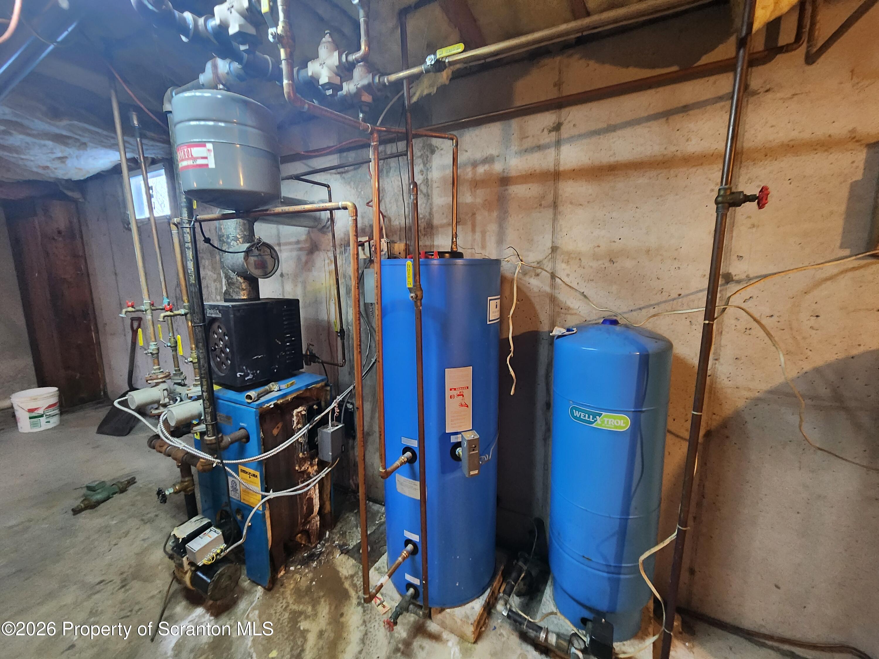 648 Dundaff Street Carbondale, PA 18407 - Photo 35 of 35 a room with musical instruments