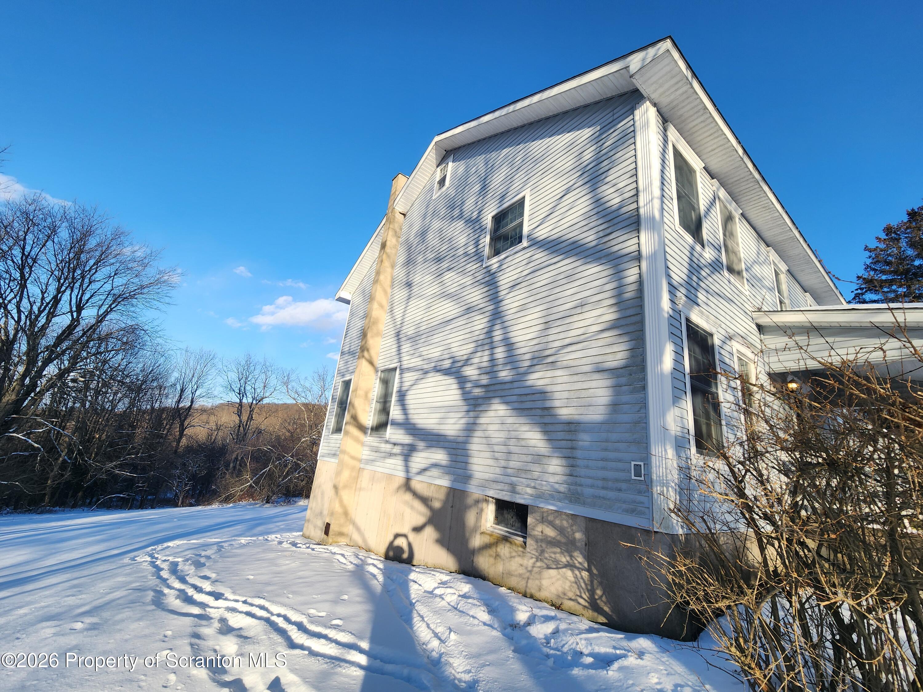 648 Dundaff Street Carbondale, PA 18407 - Photo 4 of 35 a view of a back of house