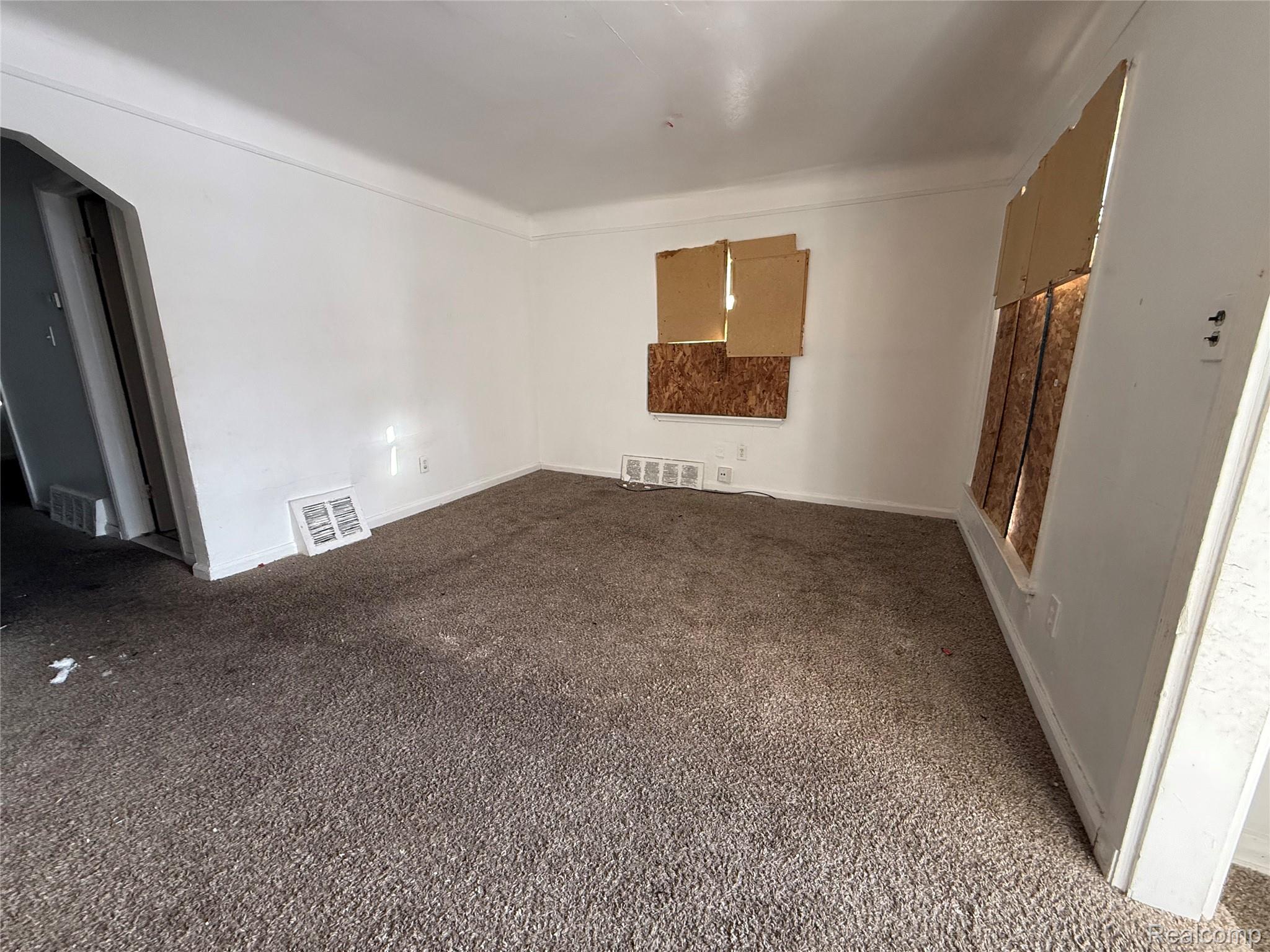 8864 Heyden Detroit, MI 48228 - Photo 4 of 16 Empty room with carpet and baseboards