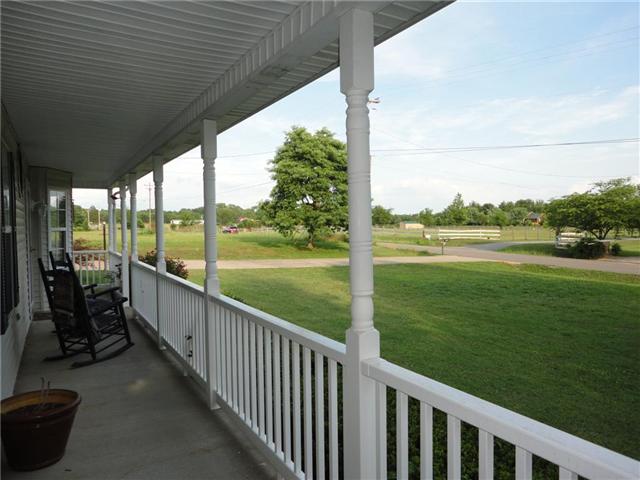 Extra long rocking chair front porch,  large front yard, and picturesque country views 