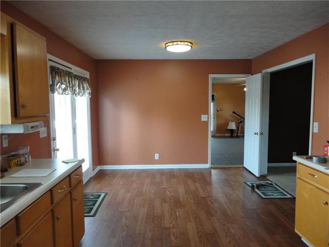Eat in kitchen with doorway to the deck area