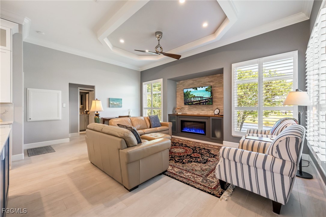 710 Birdie View Point Sanibel, FL 33957 - Photo 17 of 50 a living room with furniture and a fireplace