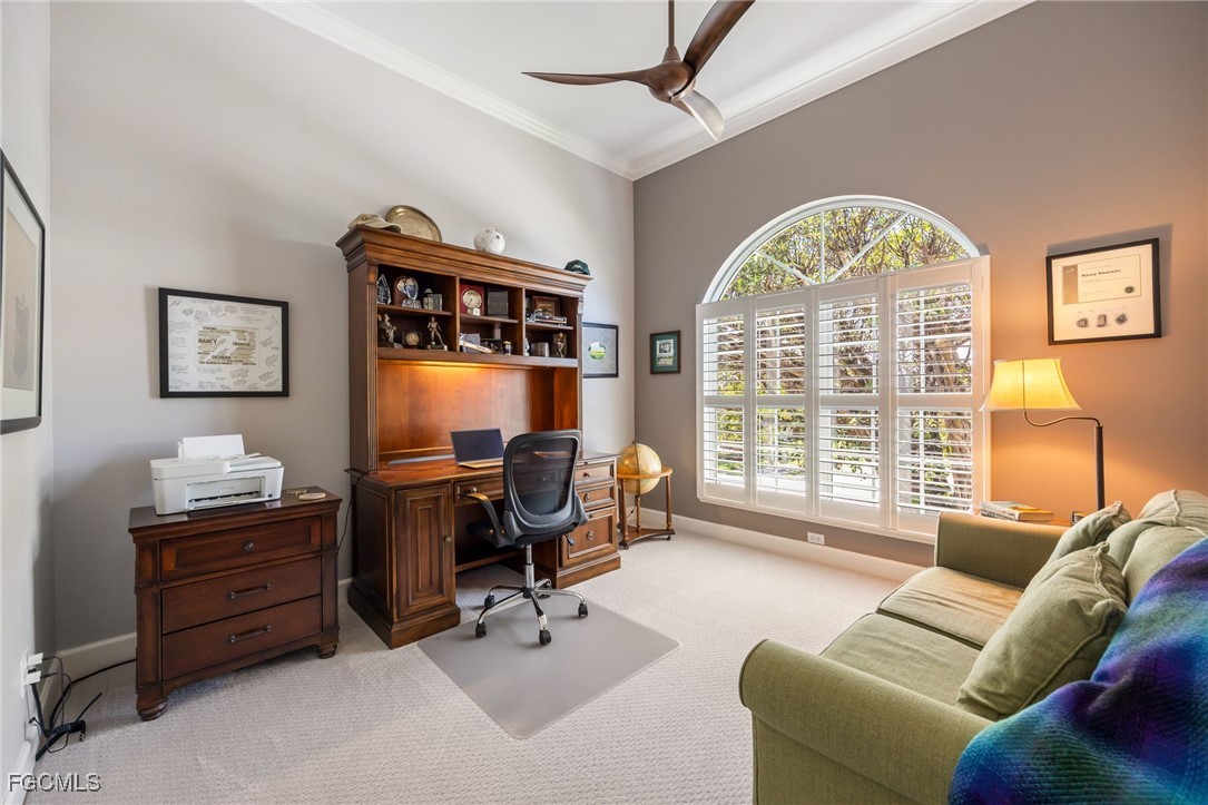 710 Birdie View Point Sanibel, FL 33957 - Photo 27 of 50 a living room with furniture and a large window