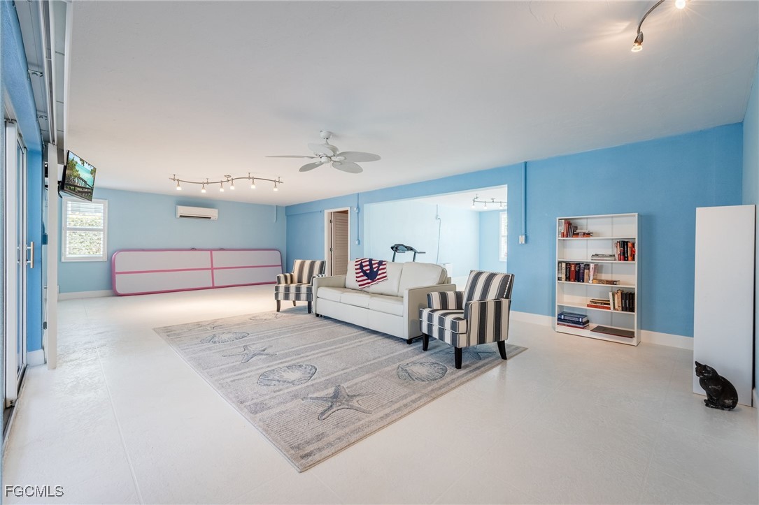 710 Birdie View Point Sanibel, FL 33957 - Photo 33 of 50 a living room with furniture and a couch