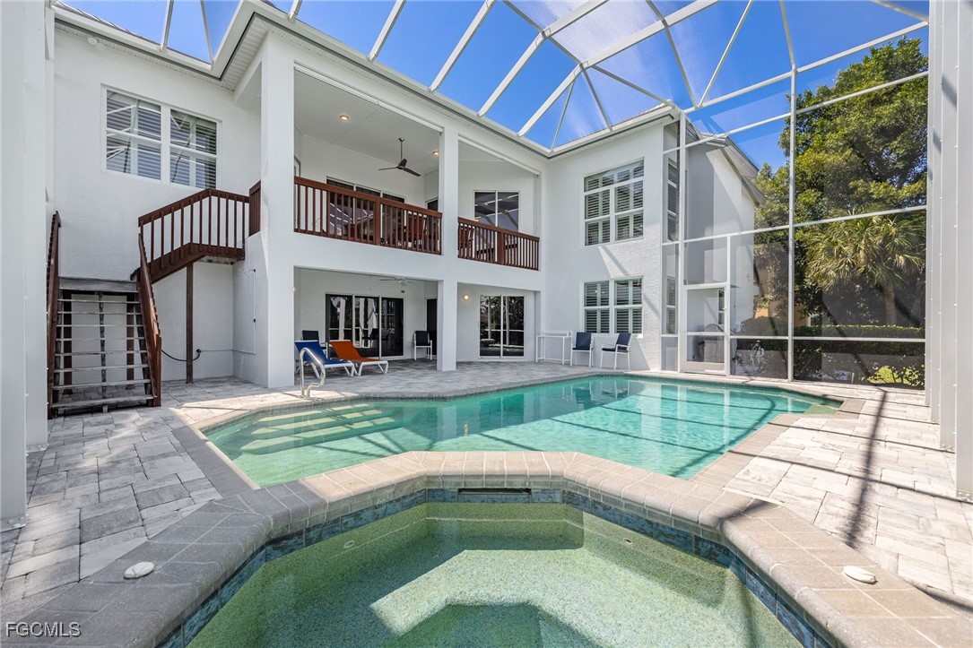 710 Birdie View Point Sanibel, FL 33957 - Photo 35 of 50 a view of a house with a swimming pool