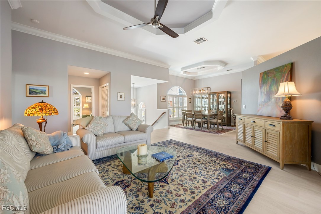 710 Birdie View Point Sanibel, FL 33957 - Photo 5 of 50 a living room with furniture and a wooden floor