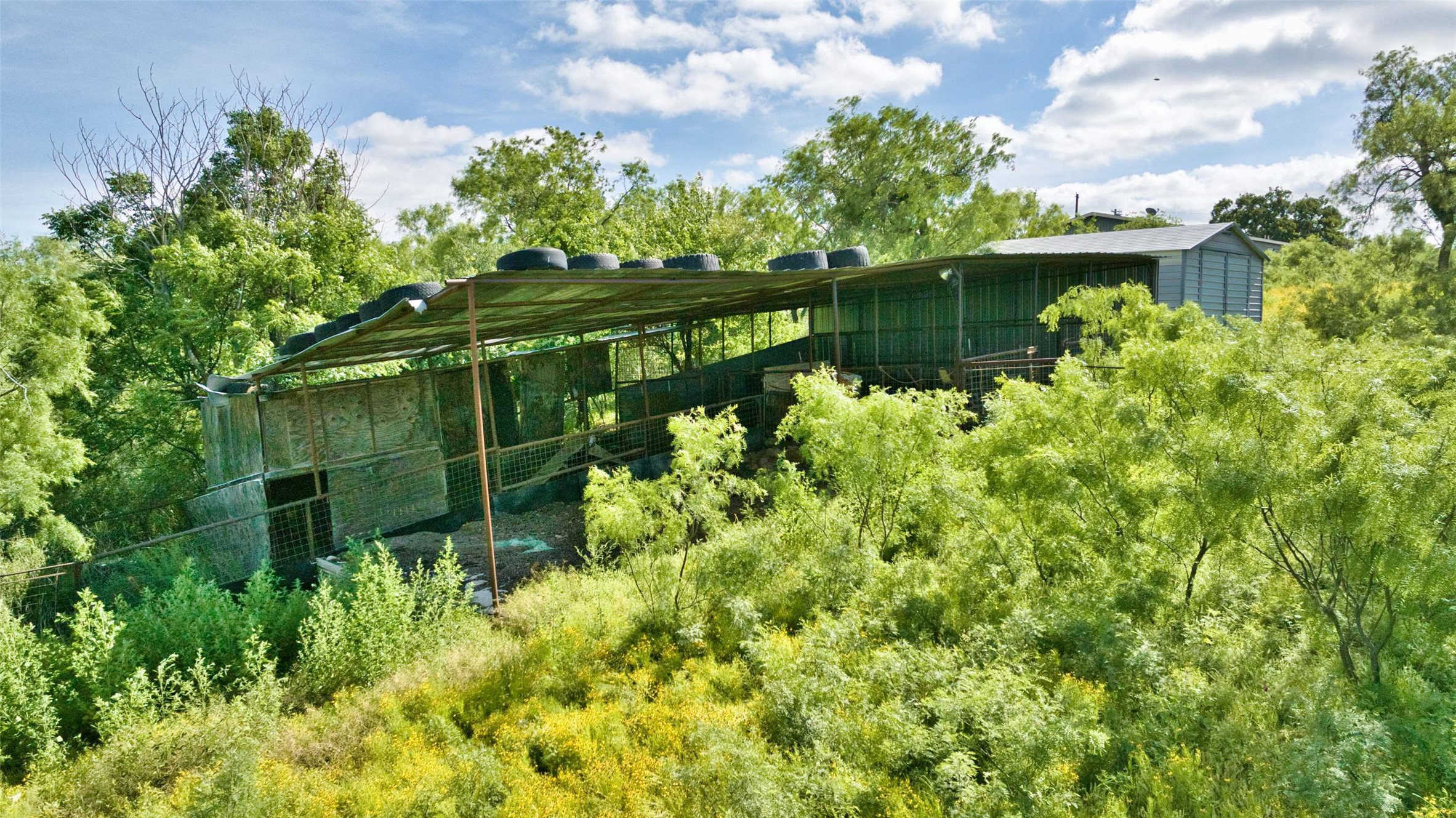 904 Bluebonnet Road Mason, TX 76856 - Photo 26 of 28 Outdoor shelter structure with a metal roof and open-air sides