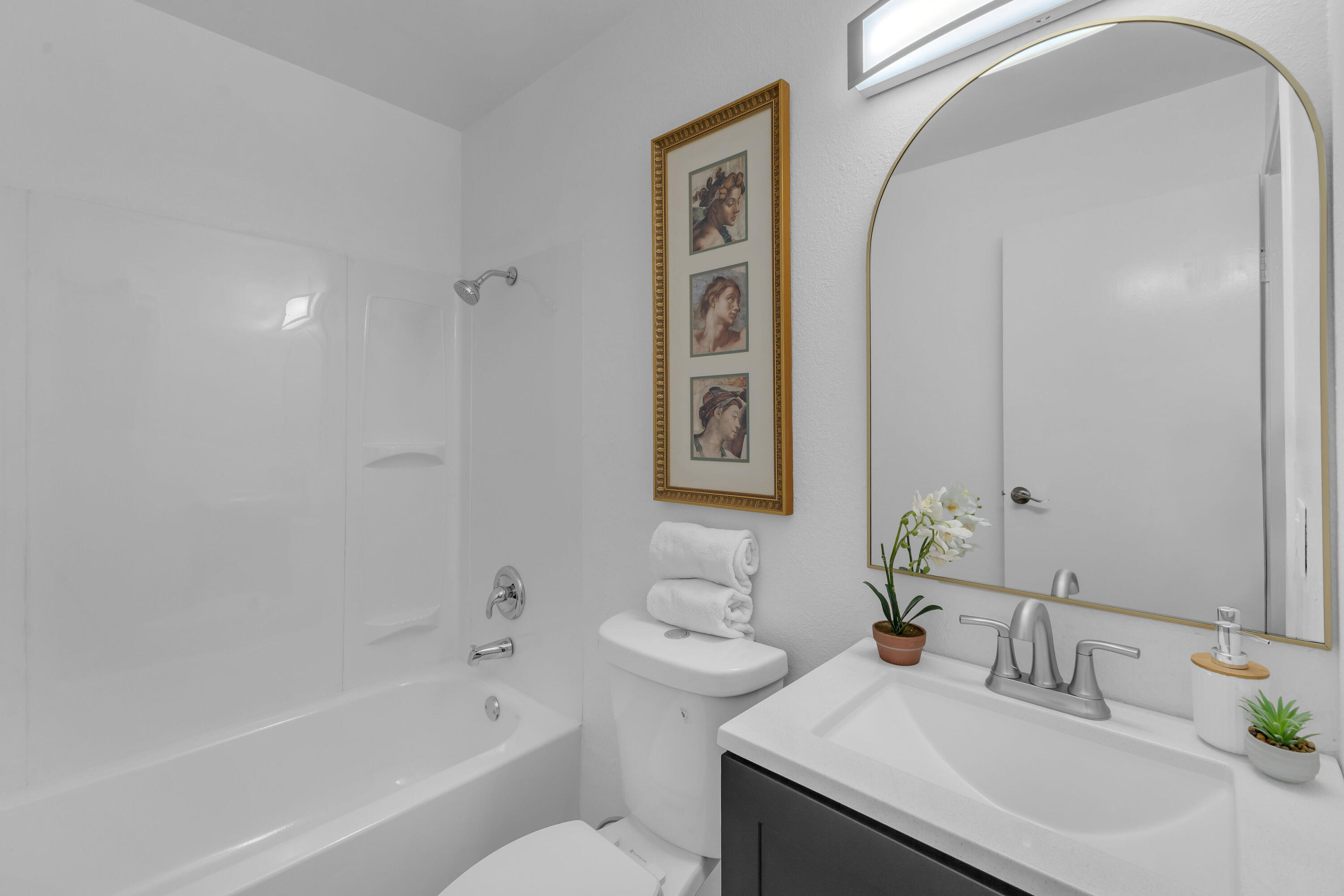 72682 Thrush Road, Unit 1 Palm Desert, CA 92260 - Photo 5 of 40 a bathroom with a sink and a mirror