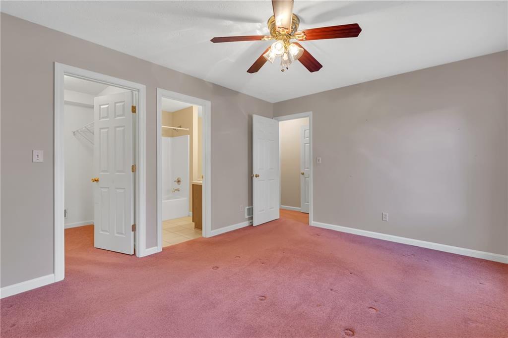 116 Windcrest Court Beaver Falls, PA 15010 - Photo 16 of 26 an empty room with chandelier fan and windows