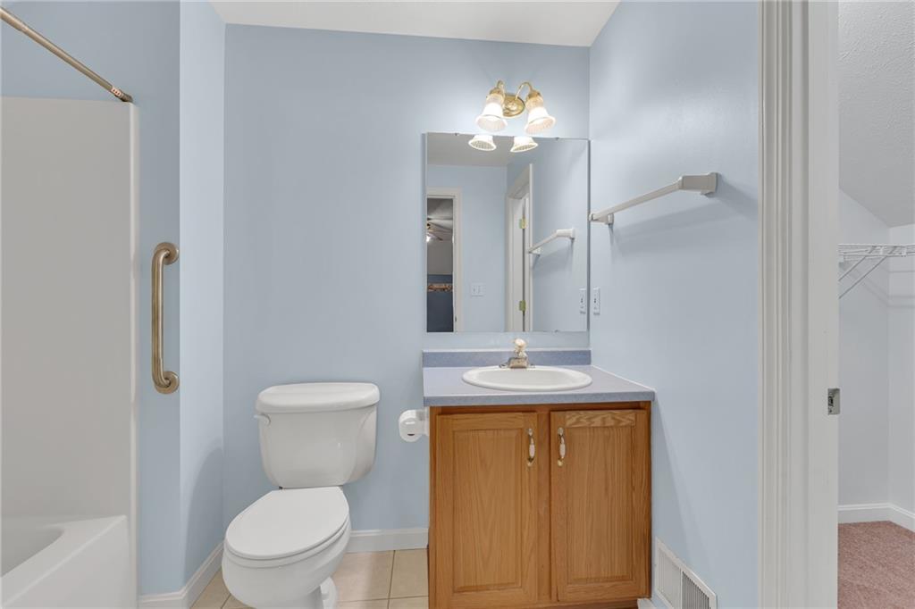 116 Windcrest Court Beaver Falls, PA 15010 - Photo 20 of 26 a bathroom with a toilet a sink and mirror