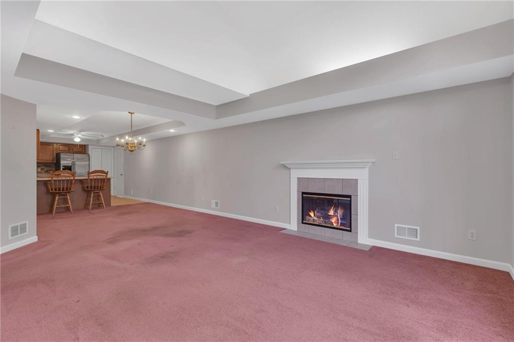116 Windcrest Court Beaver Falls, PA 15010 - Photo 9 of 26 a view of a livingroom with a fireplace and a window
