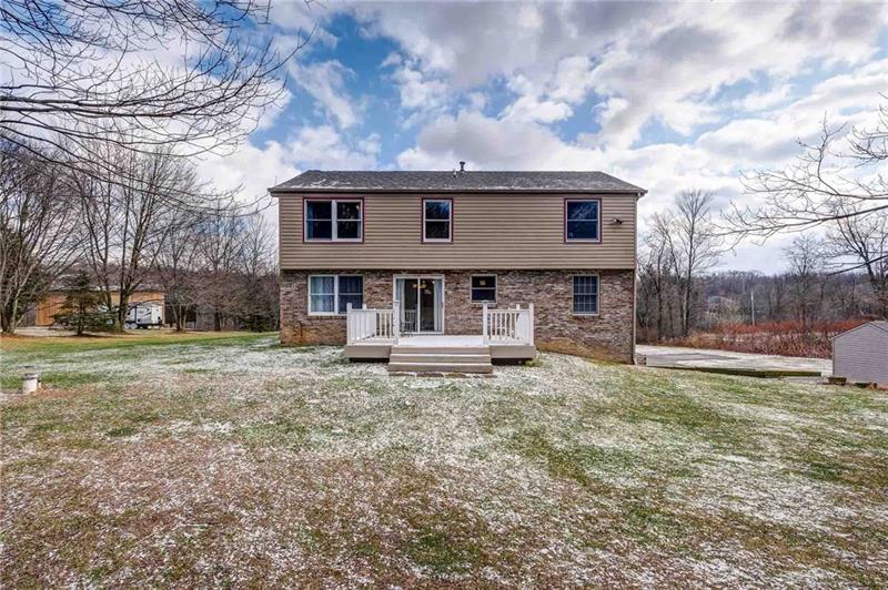 402 Three Degree Road Renfrew, PA 16053 - Photo 2 of 25 Low-maintence deck and siding with brick.