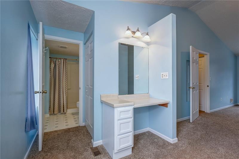 402 Three Degree Road Renfrew, PA 16053 - Photo 15 of 25 Enormous 23x11 master suite with cathedral ceilings, multiple closets, ceiling fan, vanity, & ensuite.