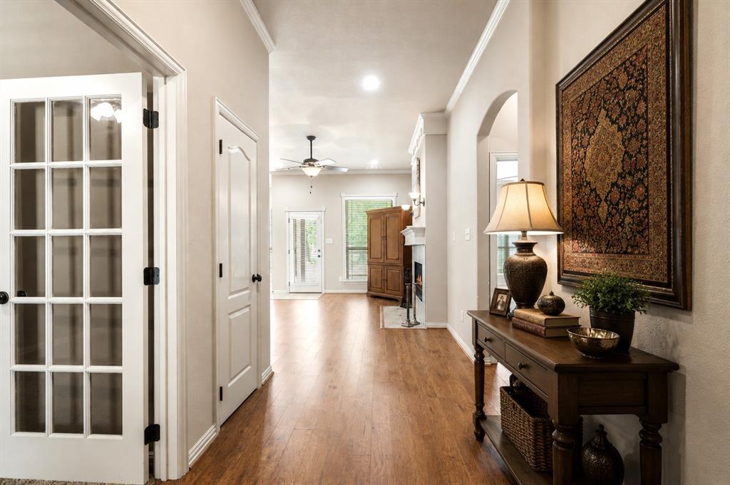 1852 Meadowview Canton, TX 75103 - Photo 4 of 28 a view of a workspace with wooden floor and windows