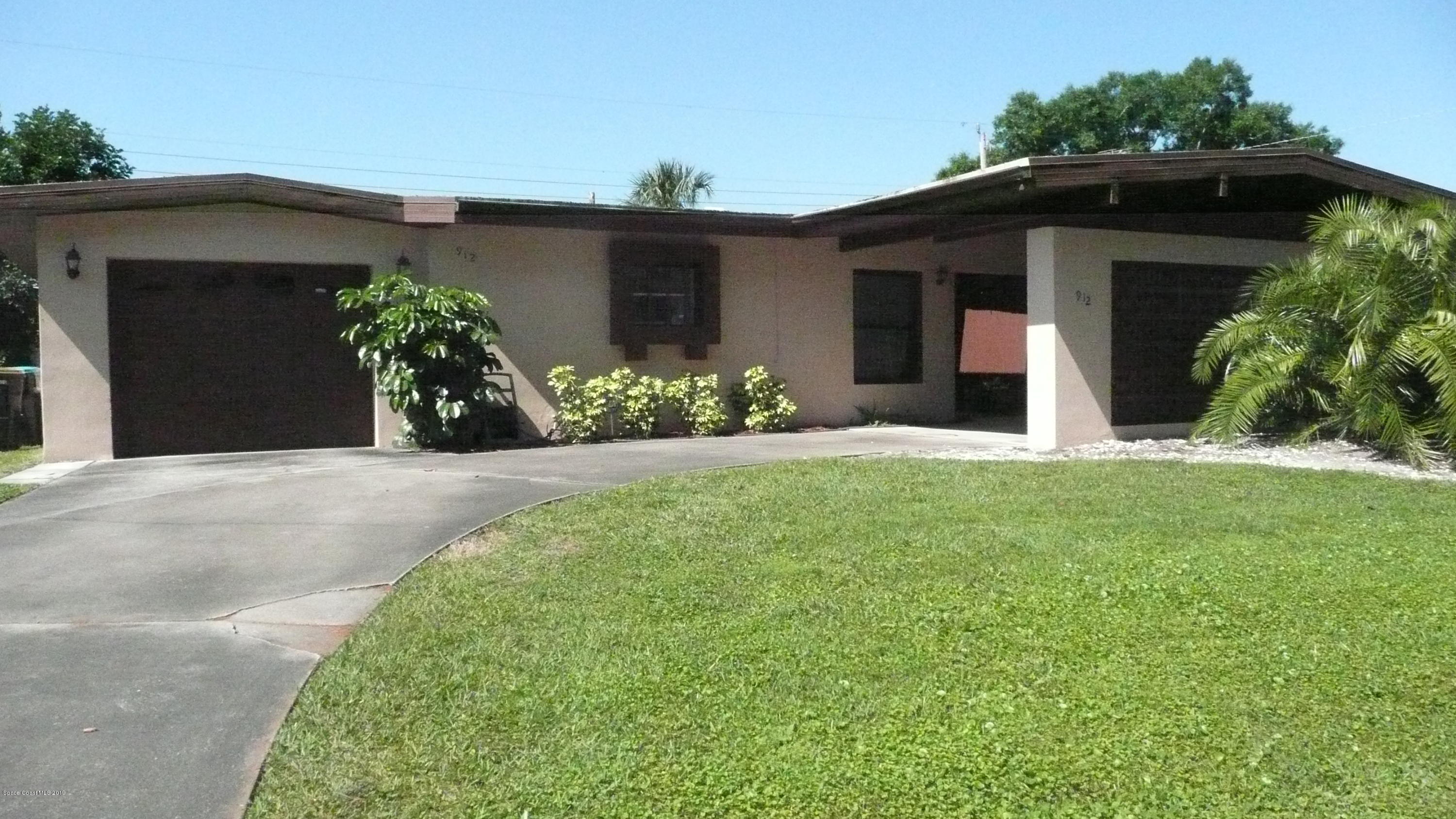 912 Chace Lane Northeast Palm Bay, FL 32905 - Photo 1 of 23 Front of House