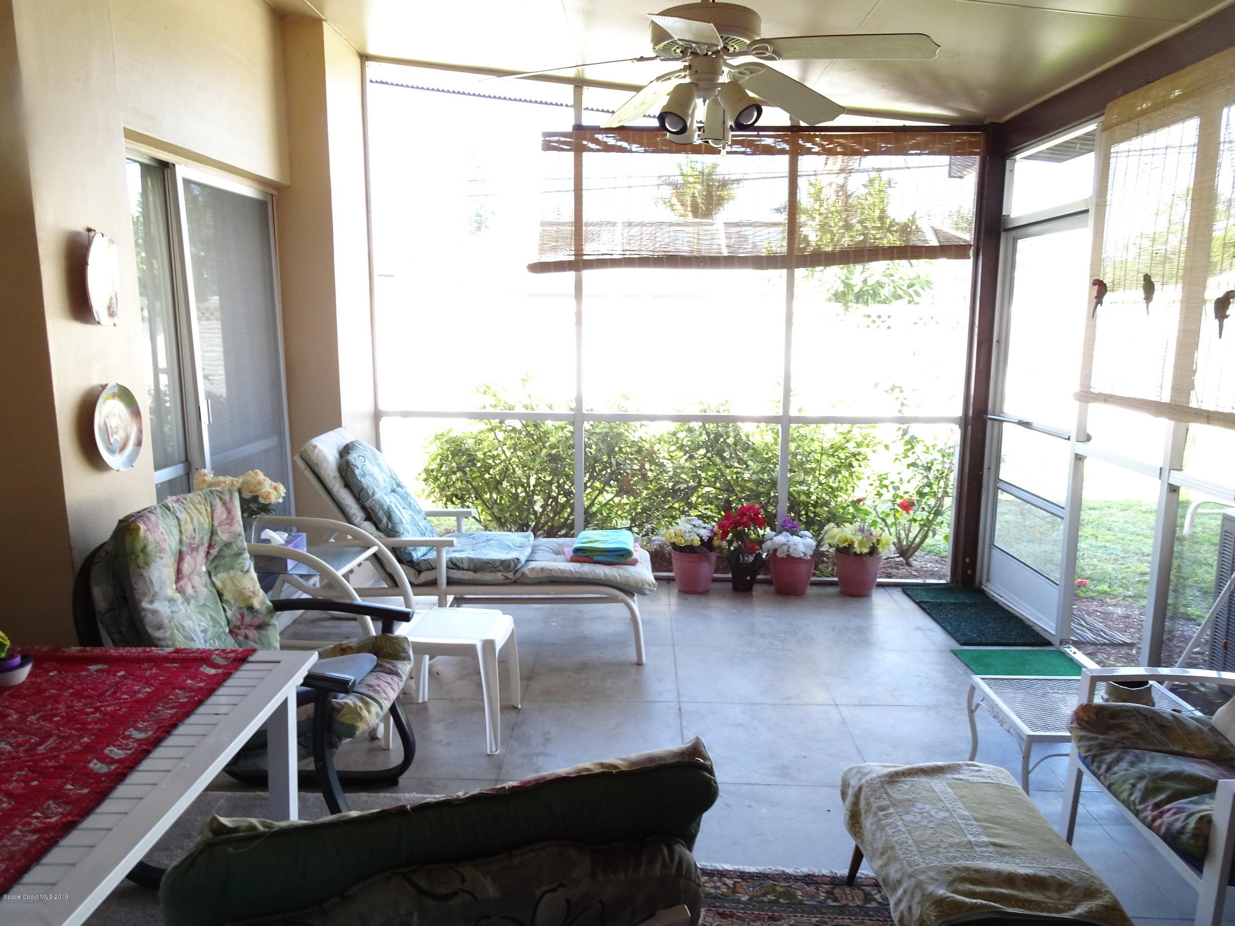 912 Chace Lane Northeast Palm Bay, FL 32905 - Photo 5 of 23 912 Chace Lane 50 screened porch