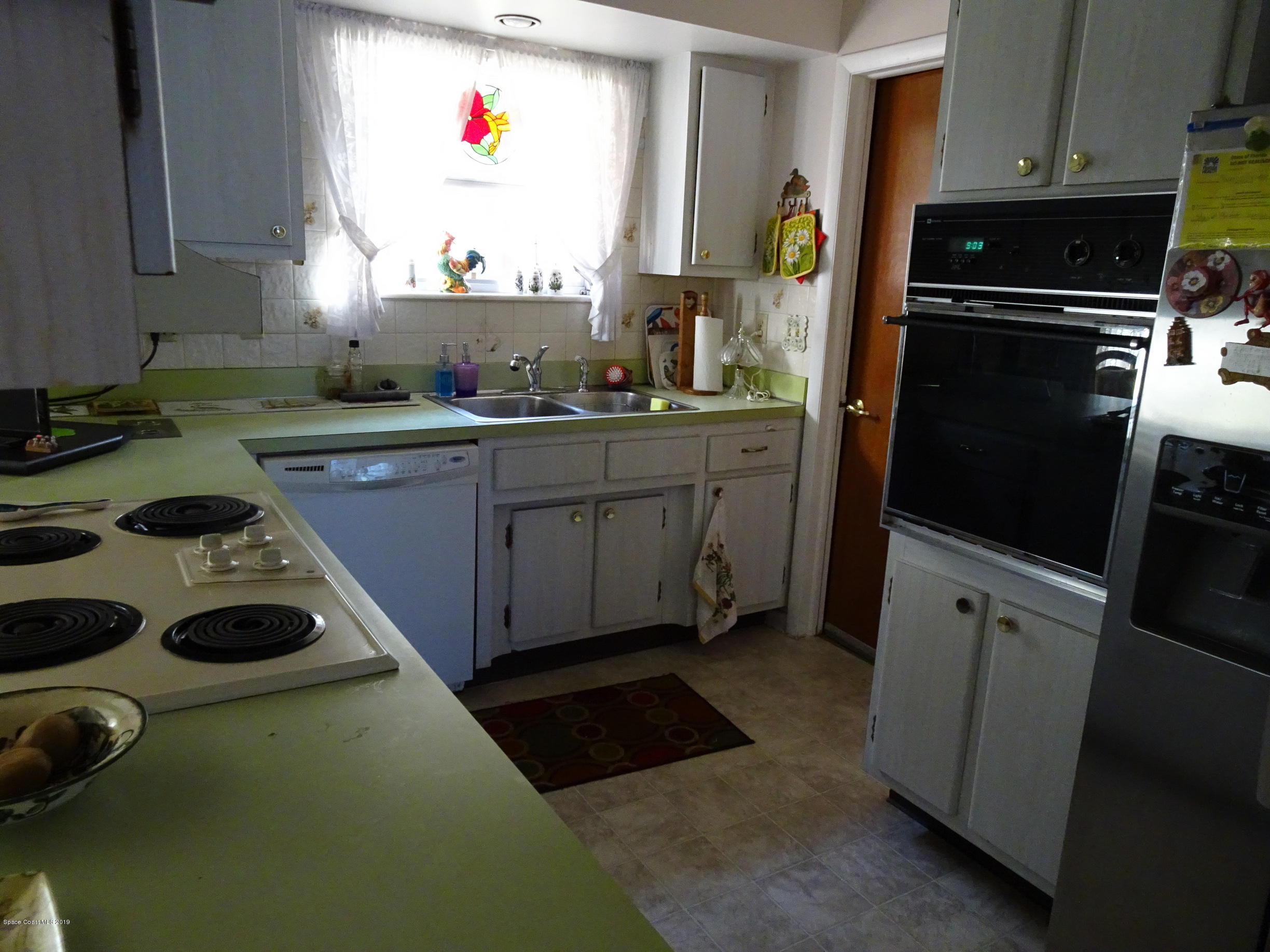 912 Chace Lane Northeast Palm Bay, FL 32905 - Photo 6 of 23 912 Chace Lane kitchen 50