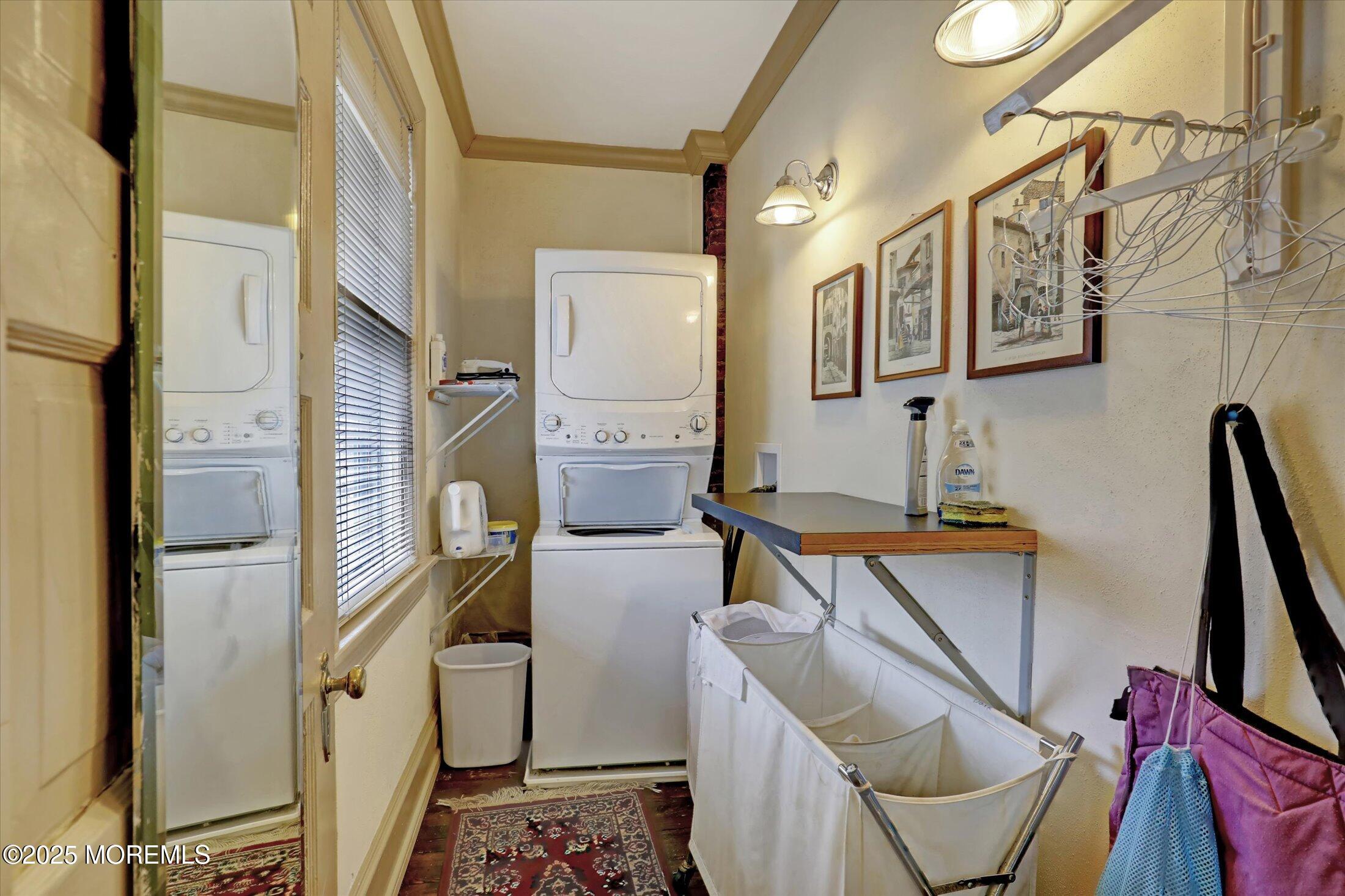 211 Cedar Avenue Allenhurst, NJ 07711 - Photo 28 of 69 a view of walk in closet with clothes and shoes