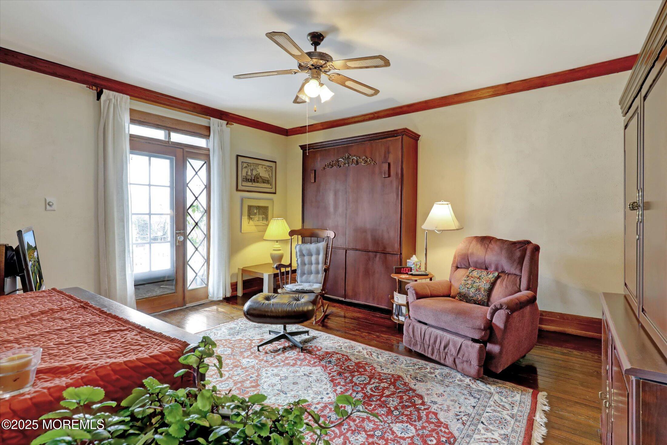211 Cedar Avenue Allenhurst, NJ 07711 - Photo 31 of 69 a living room with furniture and a large window