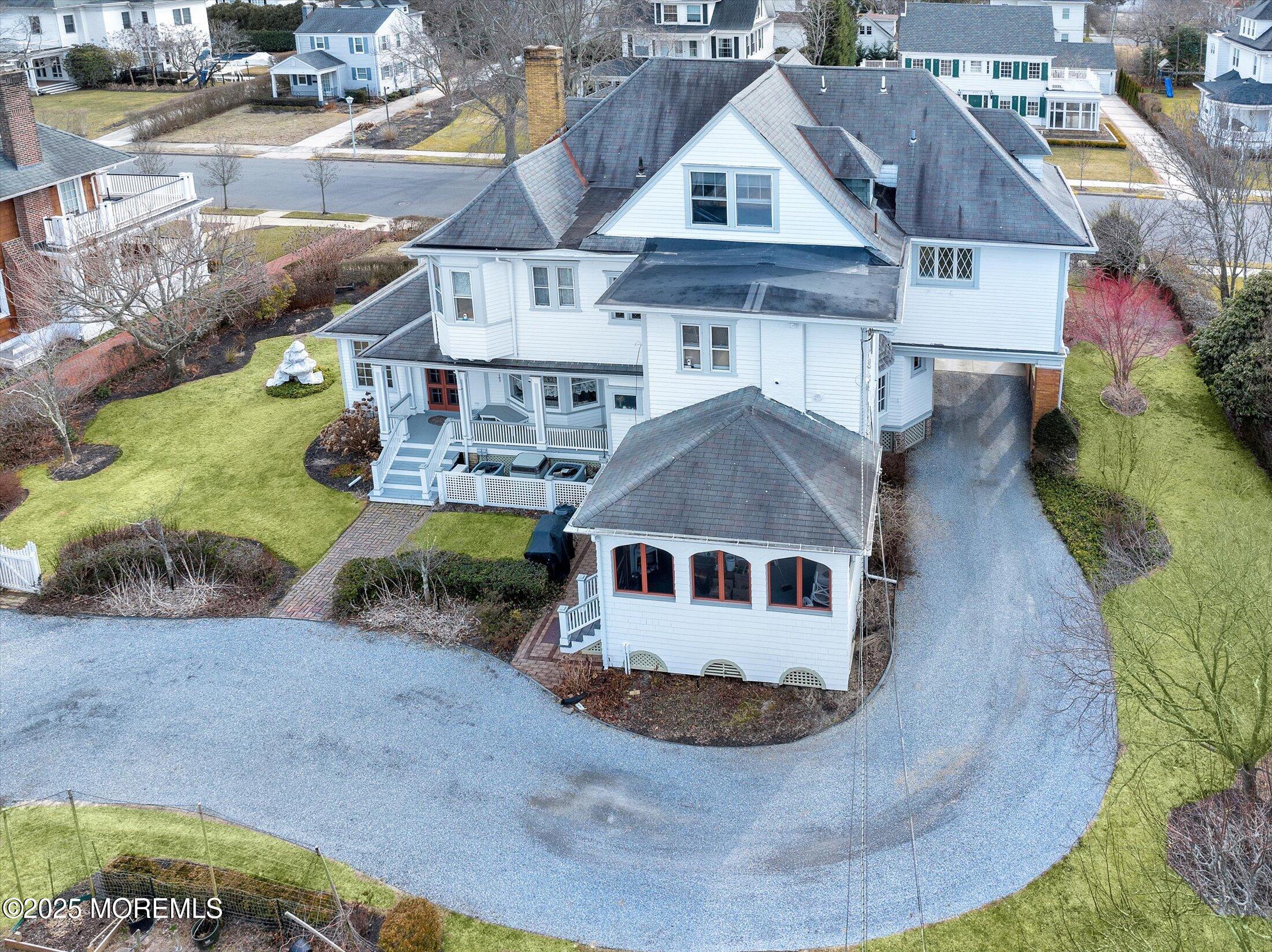 211 Cedar Avenue Allenhurst, NJ 07711 - Photo 52 of 69 an aerial view of residential houses with outdoor space