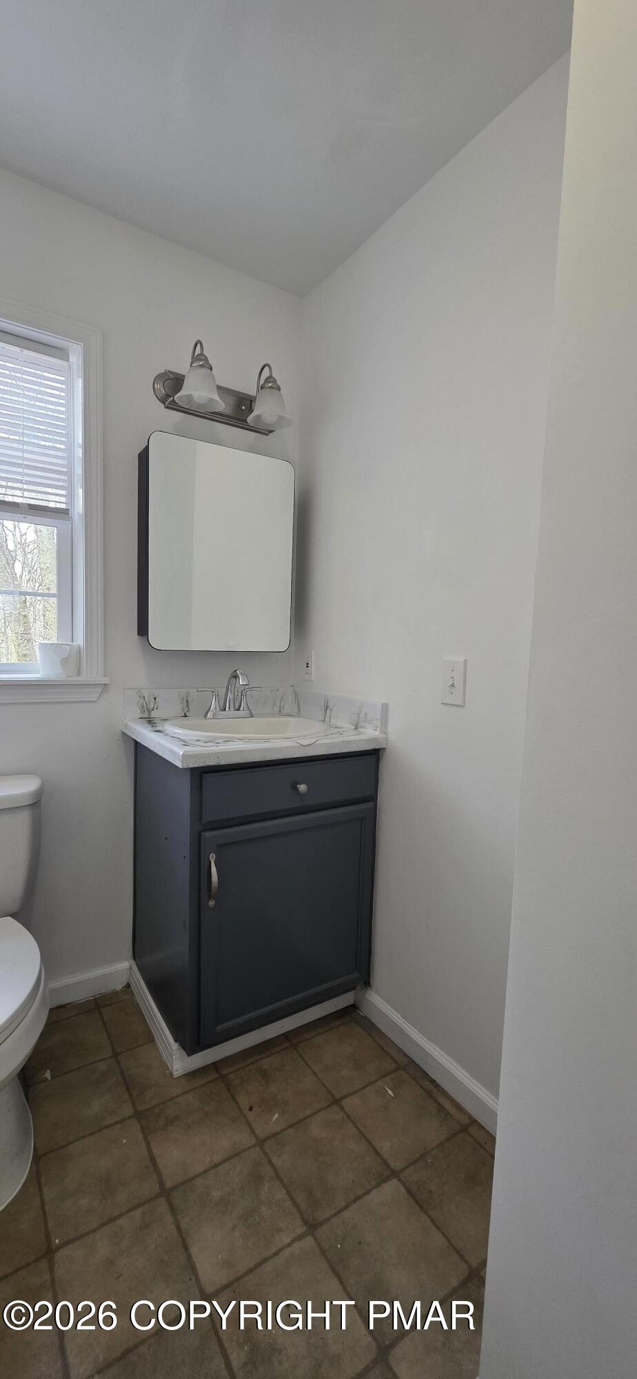 4715 Norwood Lane Tobyhanna, PA 18466 - Photo 8 of 14 a bathroom with a sink and a toilet