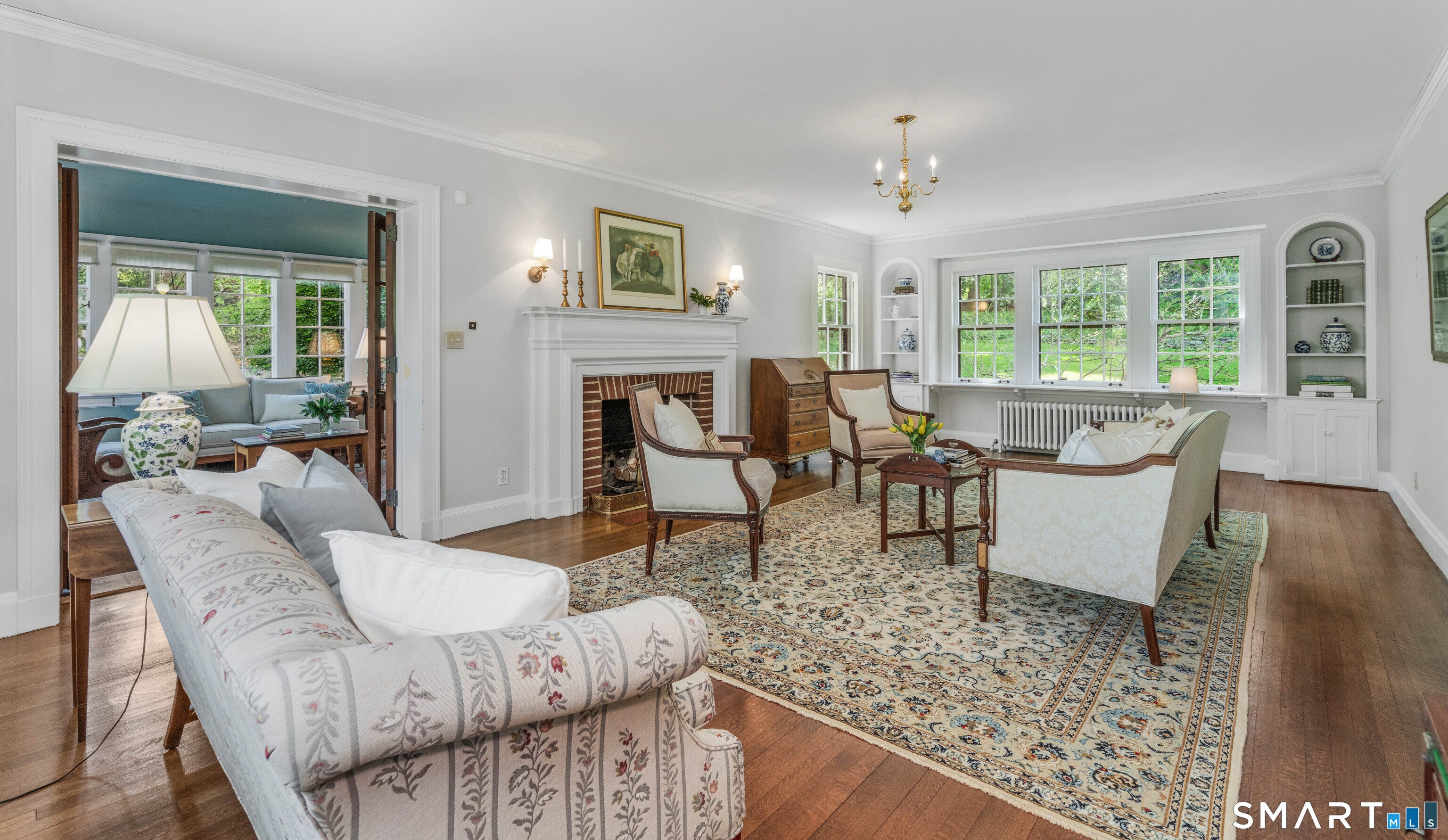 7 Fernwood Road West Hartford, CT 06119 - Photo 7 of 40 a living room with furniture and a large window