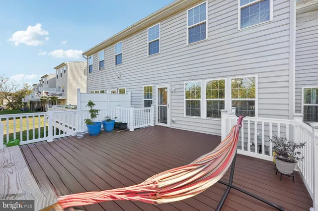 a view of a roof deck with wooden floor