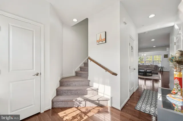 a view of entryway and livingroom with wooden floor