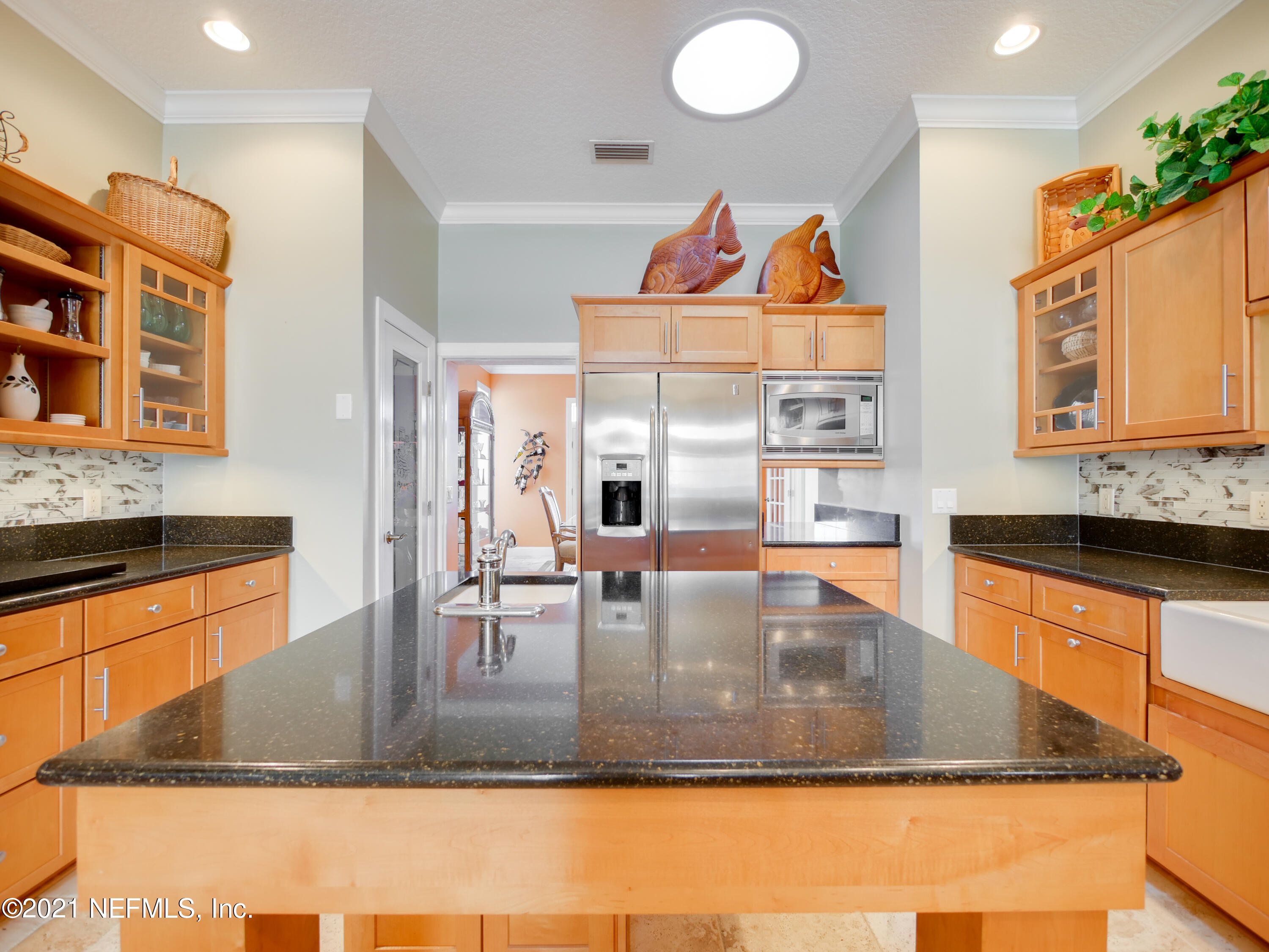 8115 A1A South St. Augustine, FL 32080 - Photo 14 of 50 a view of kitchen with cabinets and window