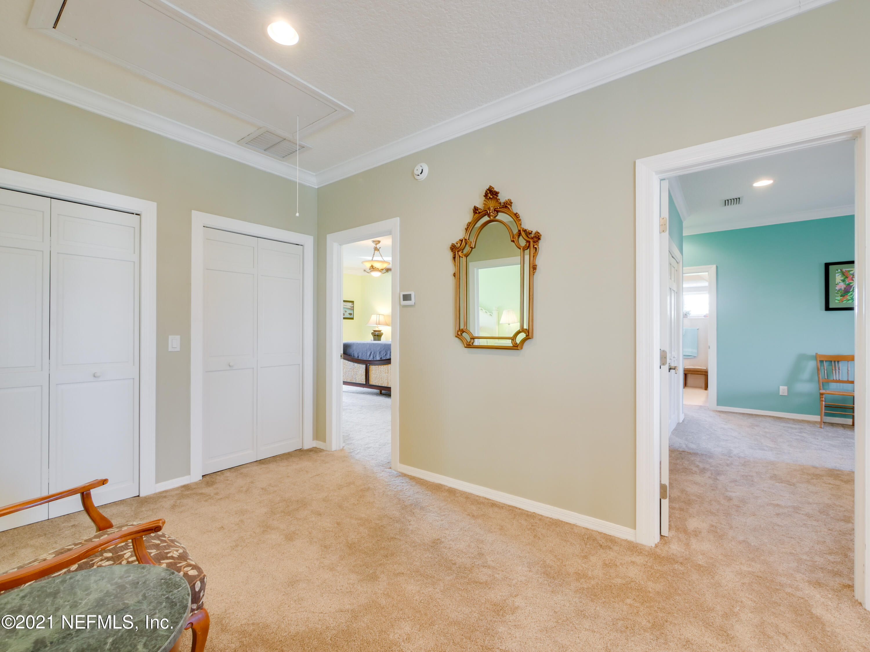 8115 A1A South St. Augustine, FL 32080 - Photo 31 of 50 a view of a livingroom with wooden floor and a bathroom