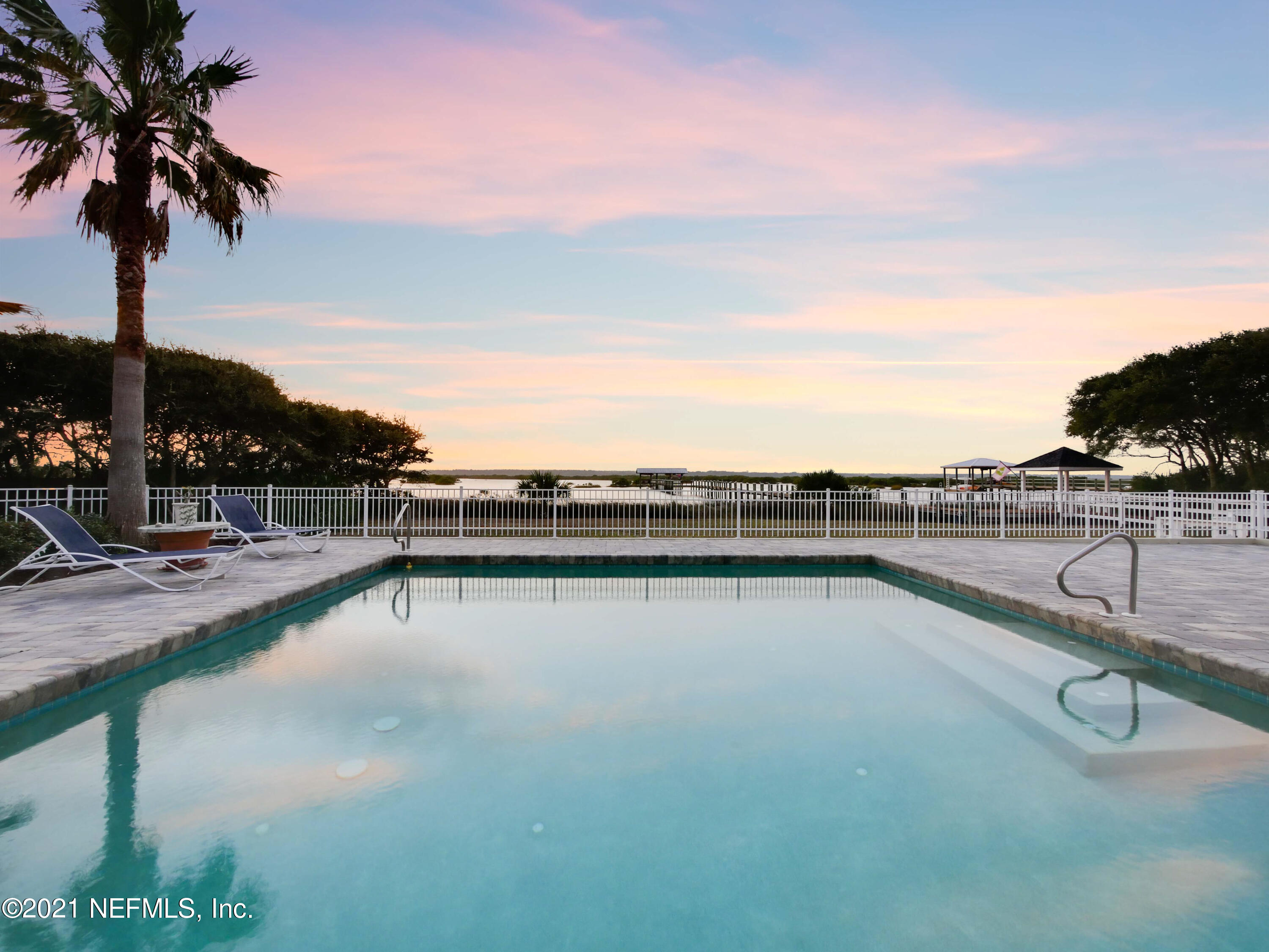 8115 A1A South St. Augustine, FL 32080 - Photo 5 of 50 a view of swimming pool with outdoor seating and city view