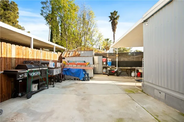 a view of street with parked cars