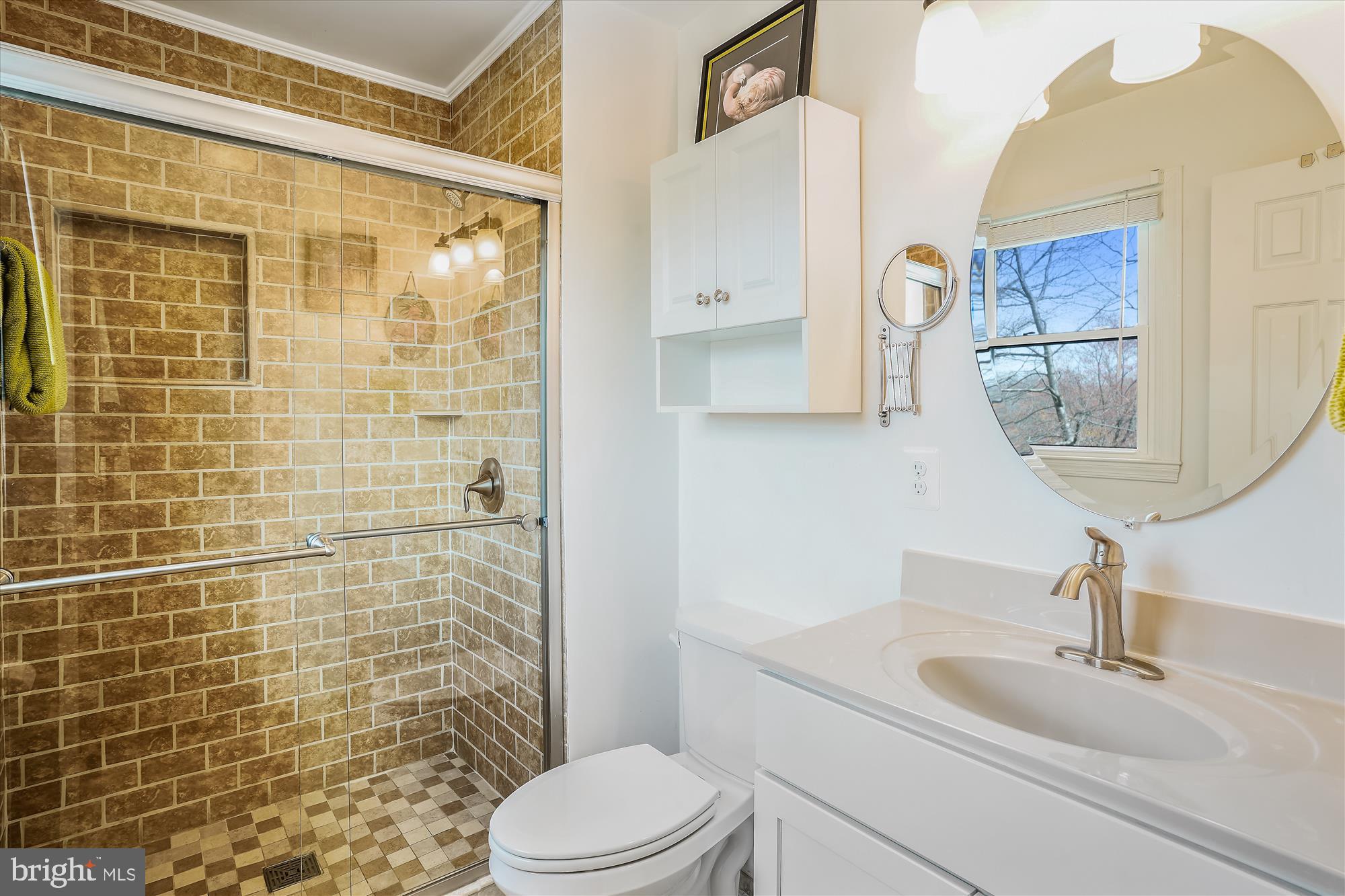 6610 Greenview Lane Springfield, VA 22152 - Photo 14 of 43 Primary bathroom with beautiful ceramic tile.