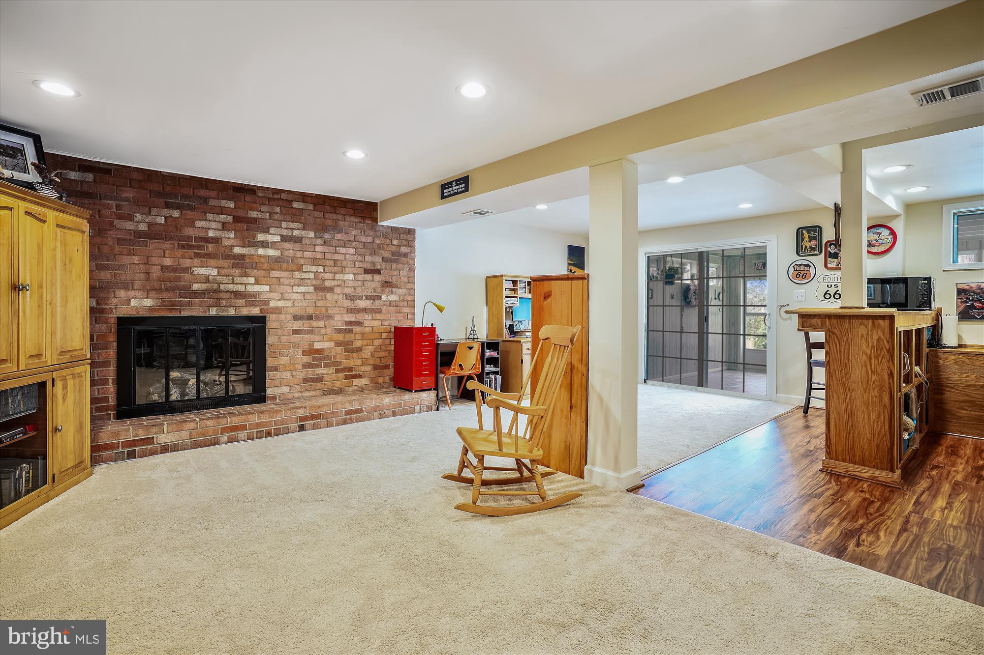 6610 Greenview Lane Springfield, VA 22152 - Photo 18 of 43 Lower level recreation room with gas fireplace.