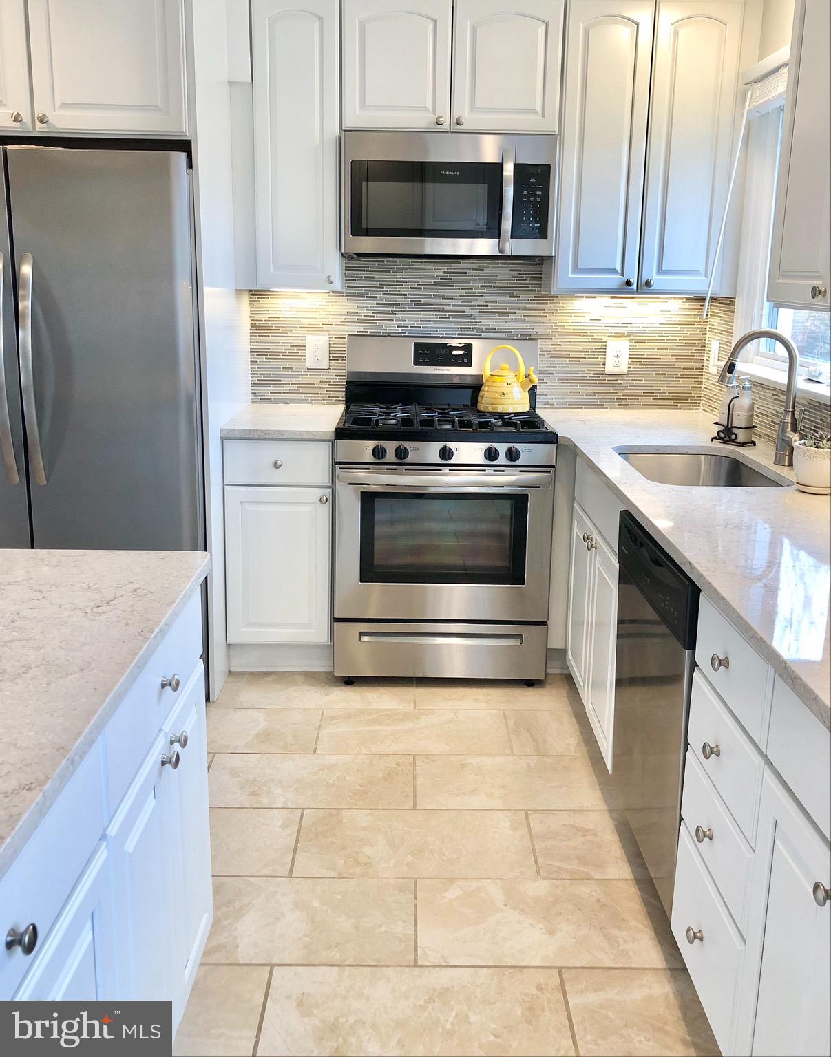 6610 Greenview Lane Springfield, VA 22152 - Photo 3 of 43 The beautiful remodel starts in the kitchen