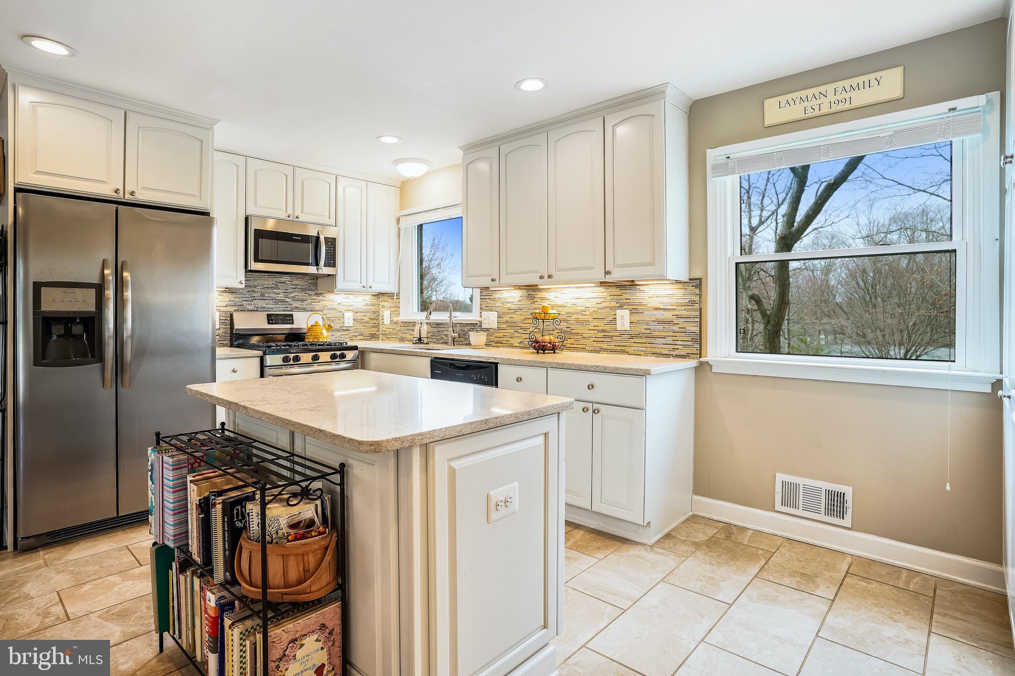 6610 Greenview Lane Springfield, VA 22152 - Photo 4 of 43 Great island for food prep and gathering