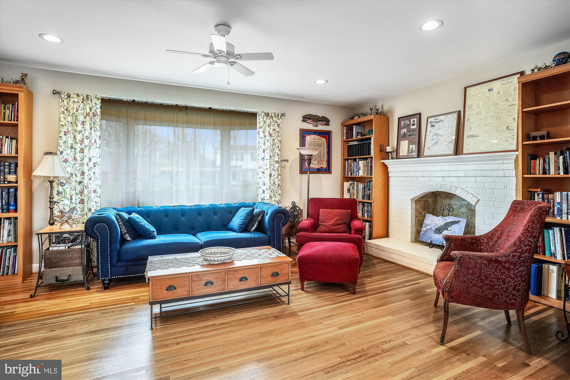 6610 Greenview Lane Springfield, VA 22152 - Photo 7 of 43 Living room w/ bay window & brick hearth fireplace