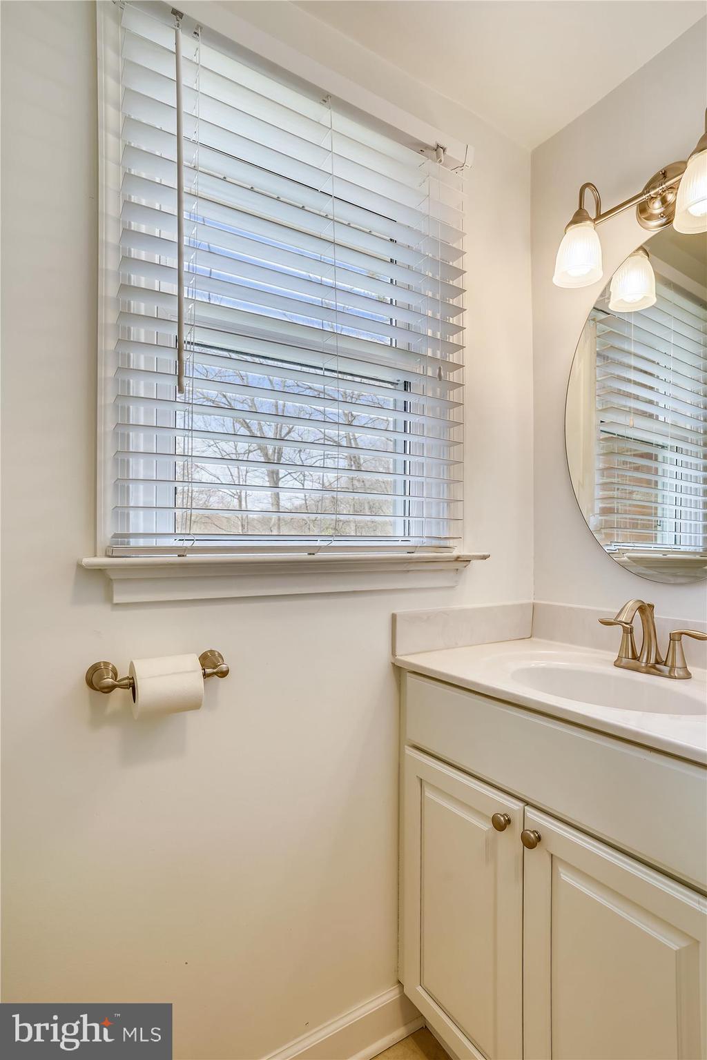 6610 Greenview Lane Springfield, VA 22152 - Photo 9 of 43 Powder room & laundry room complete entry level.