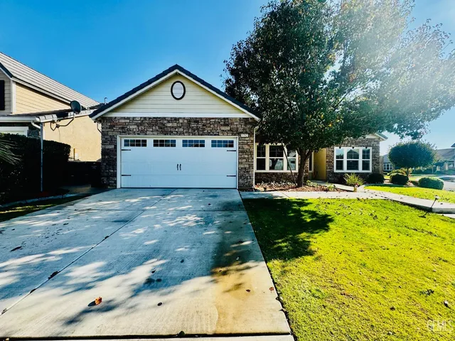 a front view of a house with swimming pool