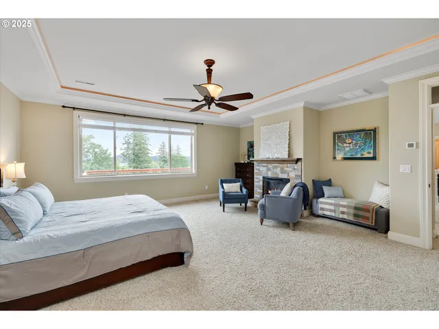 a bedroom with furniture and a window