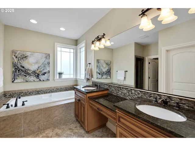 a bathroom with a sink and a bathtub