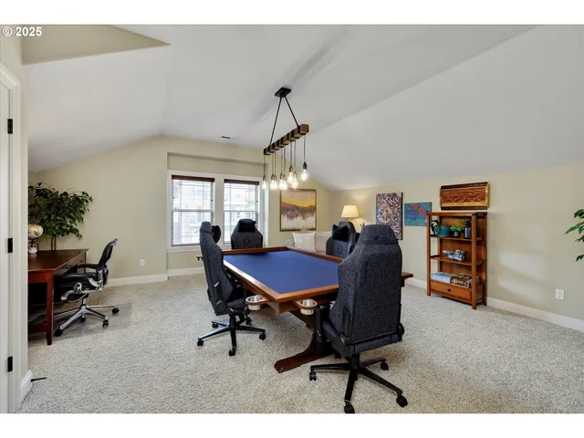 a view of a livingroom with furniture