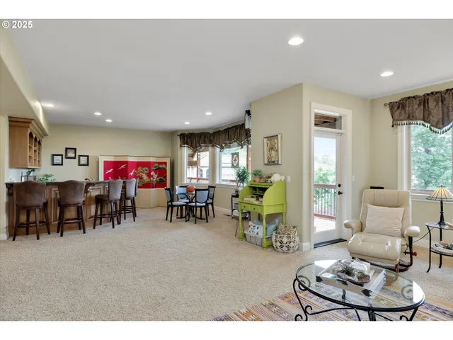 a living room with furniture and a table