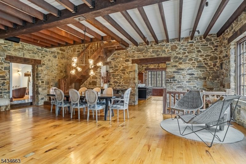 55 State Park Road Chester, NJ 07930 - Photo 11 of 48 a dining room with furniture and wooden floor