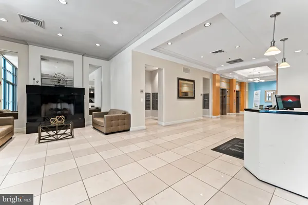 a view of a livingroom with furniture and a fireplace