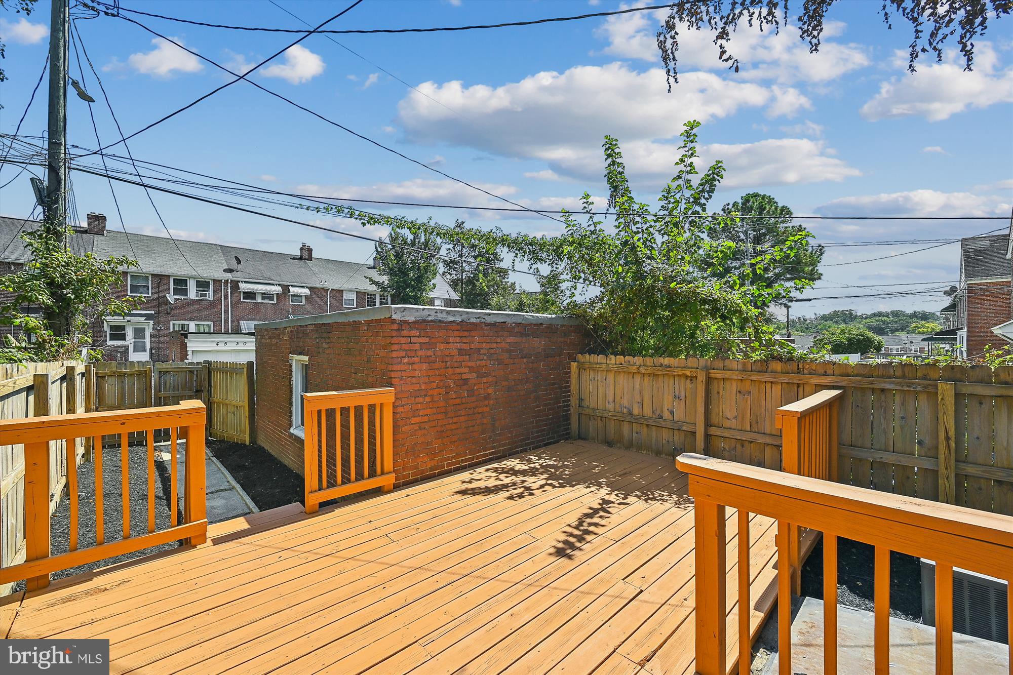 4545 Marble Hall Road Baltimore, MD 21239 - Photo 3 of 36 a view of a balcony with two chairs and a table