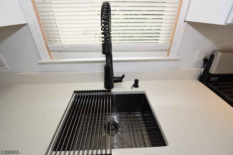 40 Glaser Avenue Raritan, NJ 08869 - Photo 4 of 28 a close view of a sink and wooden floor